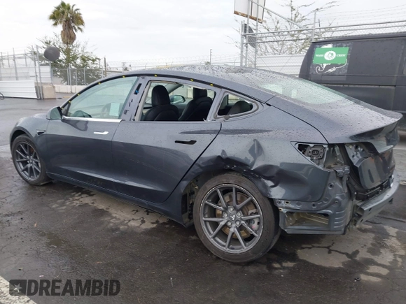 2018 Tesla Model 3 Long Range Battery with VIN 5YJ3E1EB7JF114305, listed as a IAAI auction lot 41765994 with 76,945 mi miles and . Bid and sale history available at DreamBid. Image 6.