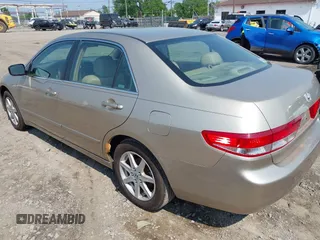 2003 Honda Accord EX with VIN 1HGCM66533A021464, listed as a IAAI auction lot 42494947 with 151,835 mi miles and . Bid and sale history available at DreamBid. Image 3.