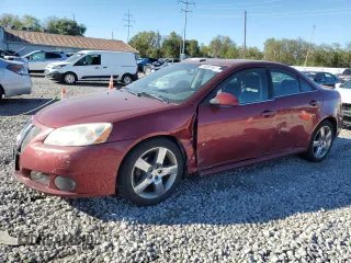 2009 Pontiac G6 GXP 1SA with VIN 1G2ZM577794193771, listed as a Copart auction lot 74696764 with 163,044 mi miles and Salvage title. Bid and sale history available at DreamBid. Image 1.