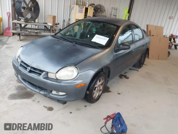 2002 Dodge Neon SXT with VIN 1B3ES56C02D596769, listed as a IAAI auction lot 41849459 with 191,629 mi miles. Bid and sale history available at carsss.com. Image 2.