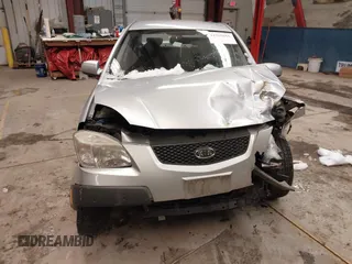 2009 Kia Rio LX with VIN KNADE223596444133, listed as a IAAI auction lot 41598865 with Not Provided miles and . Bid and sale history available at DreamBid. Image 12.