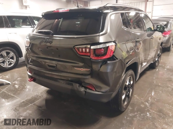 2018 Jeep Compass Trailhawk with VIN 3C4NJDDB4JT210451, listed as a IAAI auction lot 41239258 with 90,552 mi miles and . Bid and sale history available at carsss.com. Image 6.
