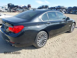 2012 BMW 7 Series 740i with VIN WBAKA4C51CC613636, listed as a IAAI auction lot 41908801 with 127,725 mi miles and . Bid and sale history available at carsss.com. Image 4.