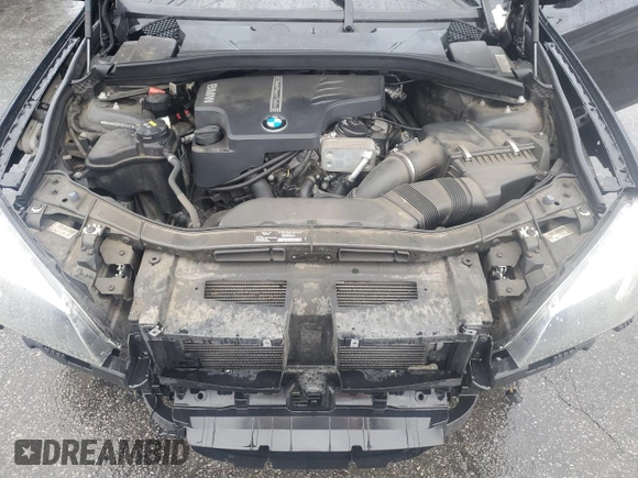 2015 BMW X1 sDrive28i with VIN WBAVM1C55FVW56937, listed as a Copart auction lot 45050785 with 77,736 mi miles and Salvage Title. Bid and sale history available at carsss.com. Image 12.