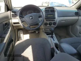 2005 Kia Spectra with VIN KNAFE162155081155, listed as a Copart auction lot 53893255 with 127,937 mi miles and Salvage Title. Bid and sale history available at carsss.com. Image 8.