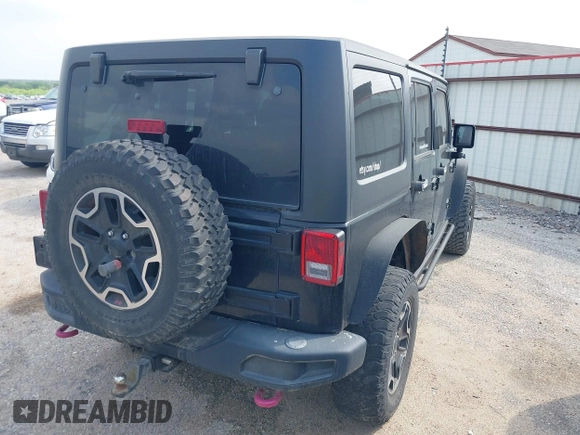 2015 Jeep Wrangler Unlimited Rubicon z VIN 1C4BJWFG2FL572417, wystawiony jako IAAI lot #41895927 z przebiegiem 54 981 mil mil oraz . Historia ofert i sprzedaży dostępna na DreamBid. Obrazek 4.