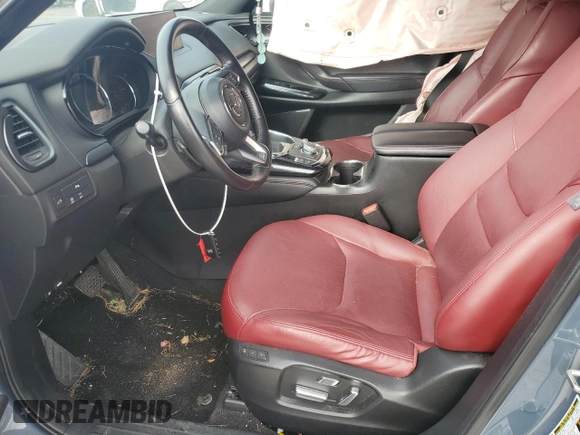 2021 Mazda CX-9 Grand Touring z VIN JM3TCADYXM0519757, wystawiony jako Copart lot #86665134 z przebiegiem 51 217 mil mil oraz Szkoda całkowita • Salvage title. Historia ofert i sprzedaży dostępna na DreamBid. Obrazek 7.