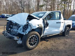 2024 Toyota Tacoma 4WD TRD Sport Hybrid with VIN 3TYLC5LN2RT003005, listed as a IAAI auction lot 41742427 with 1 mi miles. Bid and sale history available at carsss.com. Image 2.