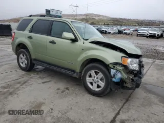 2008 Ford Escape Hybrid with VIN 1FMCU59H58KD21566, listed as a Copart auction lot 51238325 with 34,288 mi miles and Salvage title. Bid and sale history available at DreamBid. Image 4.