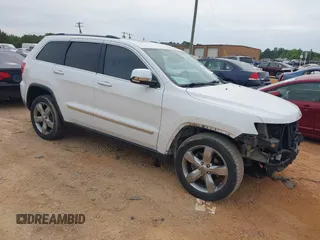 2013 Jeep Grand Cherokee Overland with VIN 1C4RJECGXDC621227, listed as a IAAI auction lot 42098042 with 194,232 mi miles and . Bid and sale history available at DreamBid. Image 1.