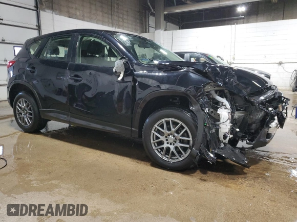 2016 Mazda CX-5 Sport with VIN JM3KE4BY9G0785317, listed as a Copart auction lot 48300935 with 32,592 mi miles and Salvage Title. Bid and sale history available at carsss.com. Image 4.