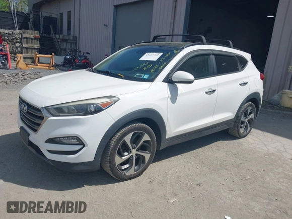 2016 Hyundai Tucson Eco with VIN KM8J3CA22GU076489, listed as a IAAI auction lot 42169732 with 153,597 mi miles. Bid and sale history available at carsss.com. Image 18.