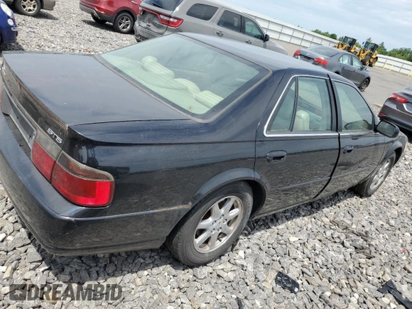1999 Cadillac Seville z VIN N0V1N, wystawiony jako Copart lot #72249294 z przebiegiem Nie podano mil oraz Nie do naprawy • Non repairable. Historia ofert i sprzedaży dostępna na DreamBid. Obrazek 3.