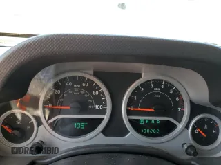 2009 Jeep Wrangler Rubicon with VIN 1J4GA64179L703716, listed as a Copart auction lot 61084215 with 190,262 mi miles and Salvage title. Bid and sale history available at DreamBid. Image 9.