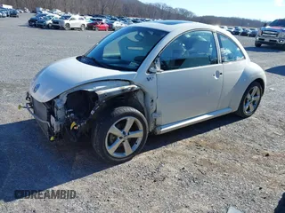 2008 Volkswagen New Beetle Coupe Triple White with VIN 3VWFW31C48M519108, listed as a IAAI auction lot 41582045 with 116,682 mi miles. Bid and sale history available at carsss.com. Image 2.