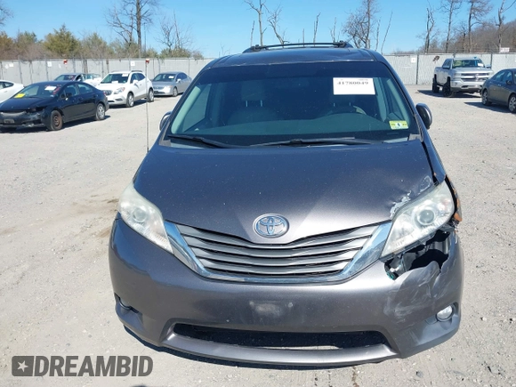 2012 Toyota Sienna XLE with VIN 5TDDK3DC5CS047530, listed as a IAAI auction lot 41780049 with 209,812 mi miles. Bid and sale history available at carsss.com. Image 13.