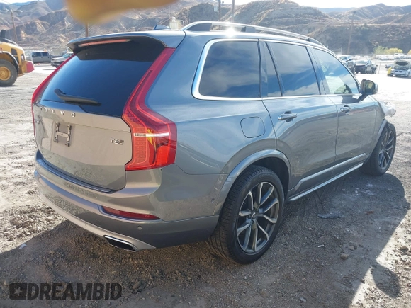2016 Volvo XC90 T6 Momentum with VIN YV4A22PK7G1077256, listed as a IAAI auction lot 41104690 with 1 mi miles. Bid and sale history available at carsss.com. Image 4.