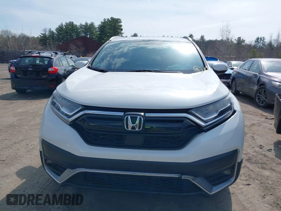 2020 Honda CR-V Touring z VIN 2HKRW2H9XLH623380, wystawiony jako IAAI lot #42039028 z przebiegiem 59 795 mil mil oraz . Historia ofert i sprzedaży dostępna na DreamBid. Obrazek 12.