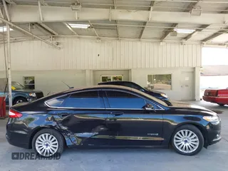 2015 Ford Fusion SE Hybrid with VIN 3FA6P0LU5FR102185, listed as a IAAI auction lot 42453553 with 172,230 mi miles and . Bid and sale history available at DreamBid. Image 13.