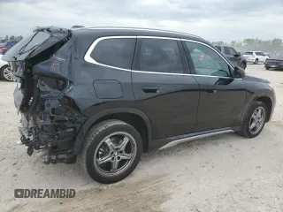 2025 BMW X1 xDrive28i with VIN WBX73EF05S5097084, listed as a Copart auction lot 53444165 with 233 mi miles and Salvage Title. Bid and sale history available at carsss.com. Image 3.