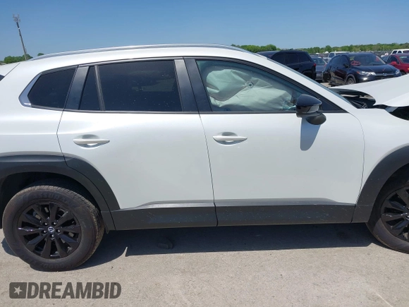 2024 Mazda CX-50 S Select с VIN 7MMVABAM9RN238736, выставлен на аукционе IAAI как лот 42003658 с пробегом 9 880 миль миль и . История ставок и продаж доступна на DreamBid. Изображение 13.