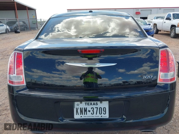 2014 Chrysler 300 S with VIN 2C3CCABG5EH205020, listed as a IAAI auction lot 42247180 with 186,458 mi miles and . Bid and sale history available at DreamBid. Image 15.