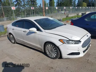 2016 Ford Fusion Titanium Hybrid with VIN 3FA6P0RU2GR357739, listed as a IAAI auction lot 42120441 with 151,201 mi miles. Bid and sale history available at carsss.com. Image 1.