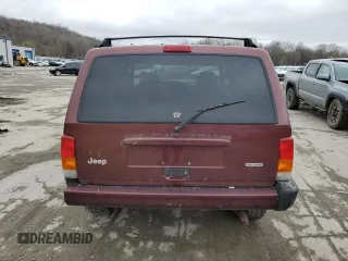 2000 Jeep Cherokee z VIN 1J4FF48S0YL254270, wystawiony jako Copart lot #52589415 z przebiegiem 166 860 mil mil oraz Szkoda całkowita • Salvage title. Historia ofert i sprzedaży dostępna na DreamBid. Obrazek 6.