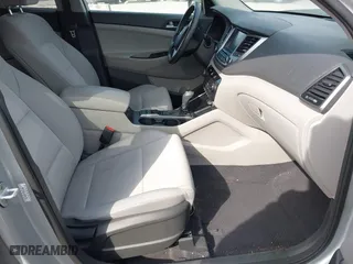 2018 Hyundai Tucson Value with VIN KM8J3CA21JU816783, listed as a IAAI auction lot 41716795 with 84,580 mi miles. Bid and sale history available at carsss.com. Image 5.