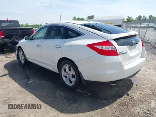 2010 Honda Crosstour EX-L z VIN 5J6TF2H55AL011092, wystawiony jako IAAI lot #42113820 z przebiegiem 239 179 mil mil oraz . Historia ofert i sprzedaży dostępna na DreamBid. Obrazek 3.