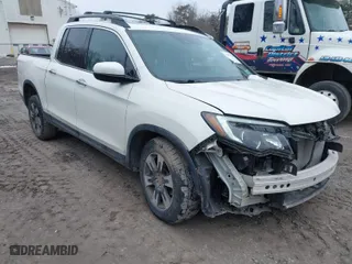 2019 Honda Ridgeline RTL-E with VIN 5FPYK3F77KB007879, listed as a IAAI auction lot 41697569 with 80,215 mi miles. Bid and sale history available at carsss.com. Image 1.