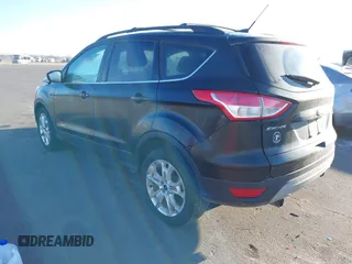 2013 Ford Escape SE with VIN 1FMCU9GX2DUC24504, listed as a IAAI auction lot 41846714 with 145,333 mi miles. Bid and sale history available at carsss.com. Image 3.