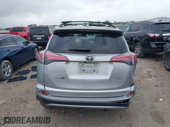 2018 Toyota RAV4 XLE with VIN JTMWFREV7JJ203609, listed as a IAAI auction lot 41938100 with 51,021 mi miles. Bid and sale history available at carsss.com. Image 16.