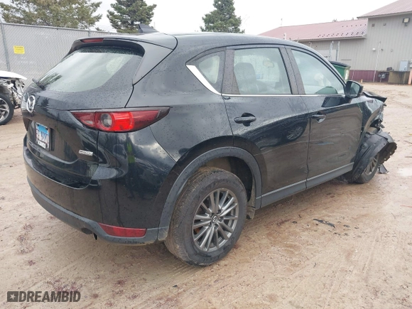 2017 Mazda CX-5 Sport with VIN JM3KFBBL5H0201857, listed as a IAAI auction lot 40885161 with 87,464 mi miles. Bid and sale history available at carsss.com. Image 4.