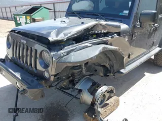 2014 Jeep Wrangler Unlimited Rubicon с VIN 1C4BJWFG2EL279938, выставлен на аукционе IAAI как лот 41920729 с пробегом 76 418 миль миль и . История ставок и продаж доступна на DreamBid. Изображение 6.