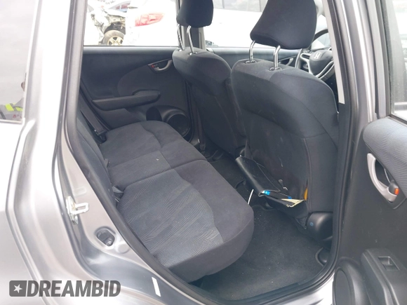 2009 Honda Fit Sport with VIN JHMGE88429S059170, listed as a IAAI auction lot 42091260 with 135,822 mi miles. Bid and sale history available at carsss.com. Image 8.