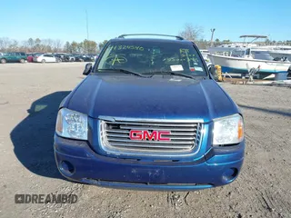 2006 GMC Envoy SLT with VIN 1GKDT13S762170322, listed as a IAAI auction lot 41324540 with 999,999 mi miles. Bid and sale history available at carsss.com. Image 11.