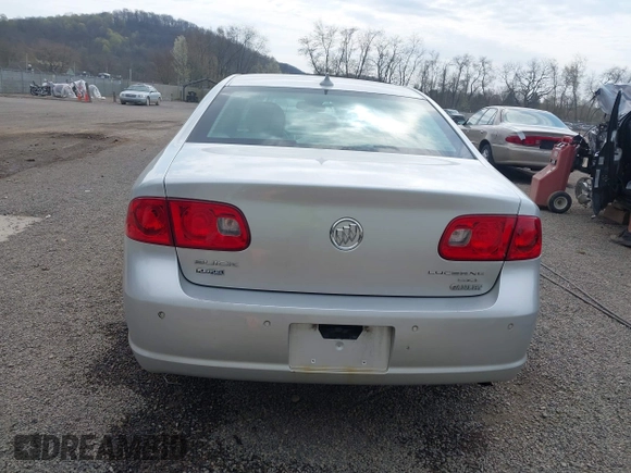 2009 Buick Lucerne CXL with VIN 1G4HD57M79U141033, listed as a IAAI auction lot 42061042 with 161,021 mi miles. Bid and sale history available at carsss.com. Image 17.