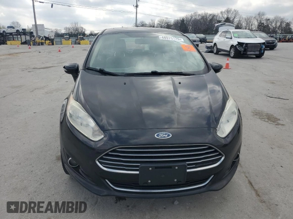 2017 Ford Fiesta Titanium with VIN 3FADP4FJXHM142648, listed as a Copart auction lot 48975125 with 82,042 mi miles and Salvage Title. Bid and sale history available at DreamBid. Image 5.
