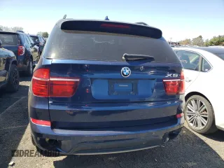 2011 BMW X5 35i z VIN 5UXZV4C55BL409215, wystawiony jako Copart lot #53169885 z przebiegiem 166 012 mil mil oraz Tytuł czysty. Historia ofert i sprzedaży dostępna na DreamBid. Obrazek 6.