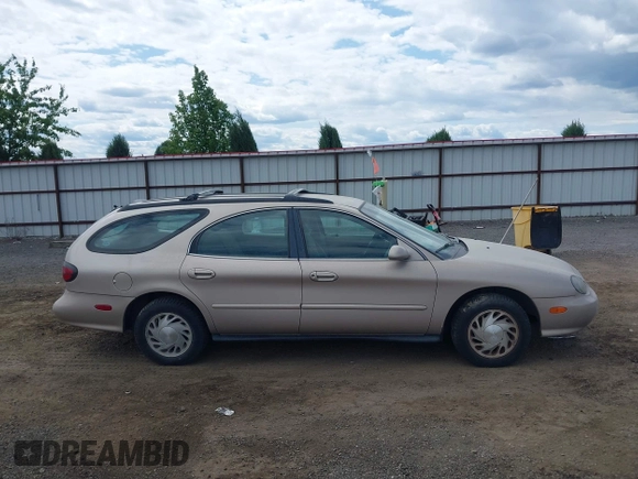1998 Ford Taurus with VIN 1FAFP57U8WG275844, listed as a IAAI auction lot 42426107 with 318,654 mi miles and . Bid and sale history available at DreamBid. Image 13.