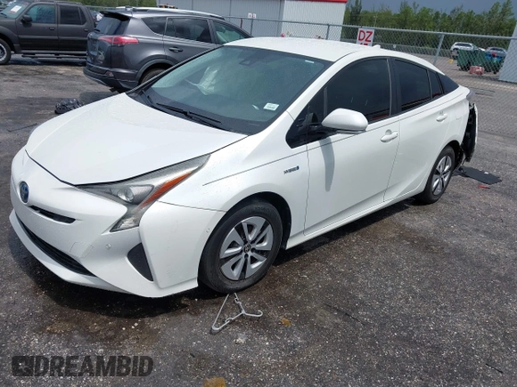 2017 Toyota Prius Two with VIN JTDKBRFU5H3044068, listed as a IAAI auction lot 42462917 with 116,261 mi miles and . Bid and sale history available at DreamBid. Image 4.