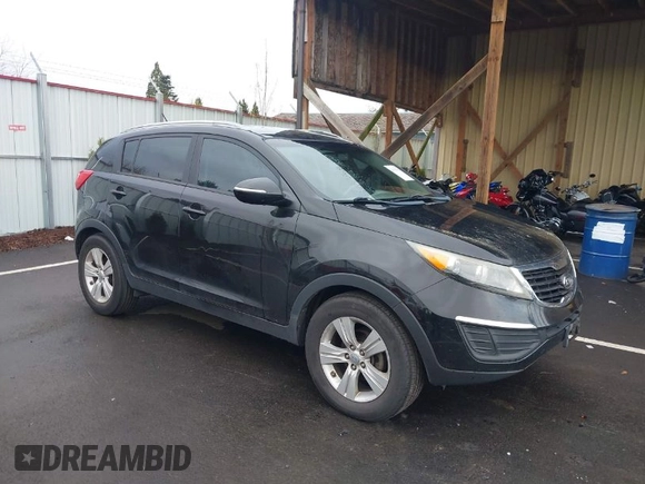 2011 Kia Sportage LX with VIN KNDPB3A26B7100916, listed as a IAAI auction lot 41939760 with 205,890 mi miles and . Bid and sale history available at carsss.com. Image 1.