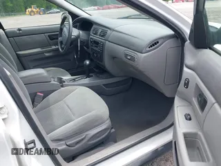 2007 Ford Taurus SE z VIN 1FAFP53U57A101188, wystawiony jako IAAI lot #42102585 z przebiegiem Nie podano mil oraz . Historia ofert i sprzedaży dostępna na DreamBid. Obrazek 5.