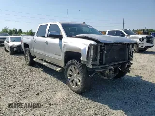 2018 Chevrolet Silverado 1500 LT with VIN 3GCUKREC6JG167804, listed as a Copart auction lot 52859235 with 124,822 mi miles and Salvage Title. Bid and sale history available at DreamBid. Image 14.