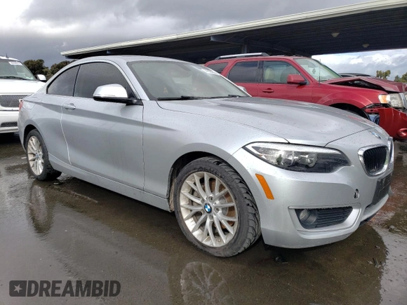 2015 BMW 2 Series 228i with VIN WBA1F5C57FV256927, listed as a Copart auction lot 41628804 with 125,695 mi miles. Bid and sale history available at carsss.com. Image 4.
