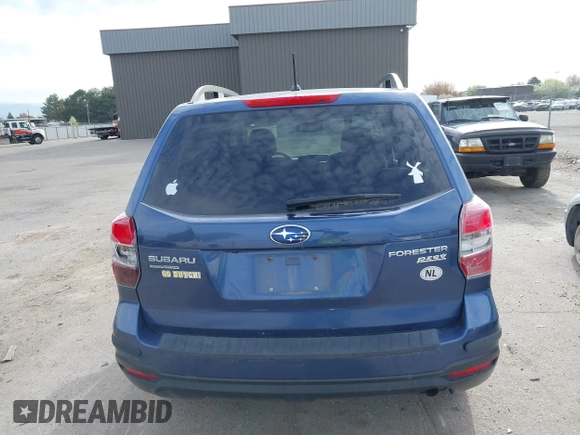 2014 Subaru Forester Premium z VIN JF2SJADC0EH551474, wystawiony jako IAAI lot #41977613 z przebiegiem 62 979 mil mil oraz . Historia ofert i sprzedaży dostępna na DreamBid. Obrazek 17.