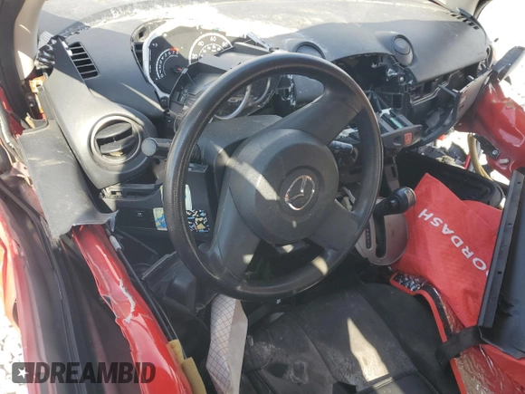2014 Mazda 2 Sport with VIN JM1DE1KY2E0185106, listed as a Copart auction lot 47486205 with Not Provided miles and Salvage Title. Bid and sale history available at DreamBid. Image 8.