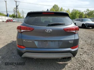 2018 Hyundai Tucson Sport z VIN KM8J3CAL4JU779009, wystawiony jako Copart lot #52777484 z przebiegiem 51 712 mil mil oraz Szkoda całkowita • Salvage title. Historia ofert i sprzedaży dostępna na DreamBid. Obrazek 6.