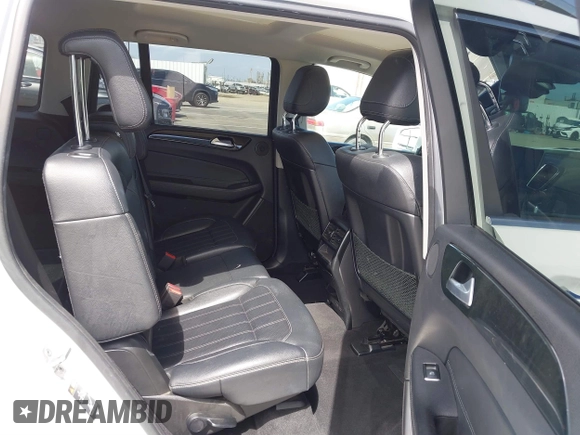 2018 Mercedes-Benz GLS 450 with VIN 4JGDF6EE9JB049030, listed as a IAAI auction lot 41804243 with 60,985 mi miles and . Bid and sale history available at DreamBid. Image 8.